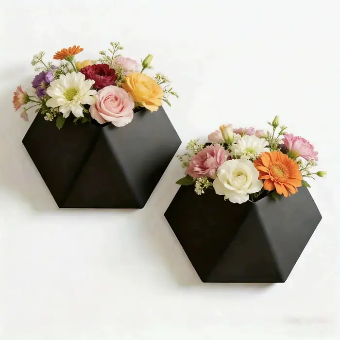 Pot de fleurs mural hexagonal noir avec trous de fixation