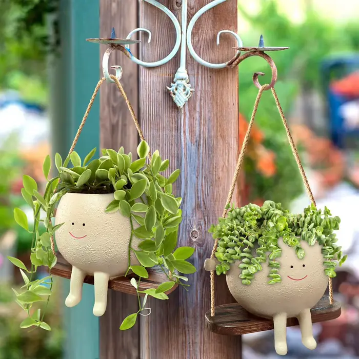 Pot de jardinière à visage pivotant